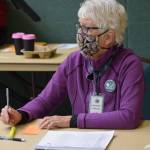 Susan Smalley works at the Kenai No. 2 precinct for Election Day on Tuesday, Oct. 5, 2021. (Camille Botello/Peninsula Clarion)