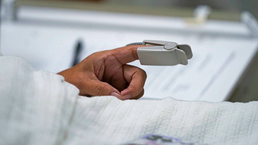 Joyce Johnson-Albert receives an antibody infusion while lying on a bed in a trauma room at the Upper Tanana Health Center Wednesday, Sept. 22, 2021, in Tok, Alaska. Johnson-Albert was optimistic but also realistic. I just hope the next few days Ill be getting a little better than now, Johnson-Albert told a reporter on the other side of a closed, sliding glass door to the treatment room two days after testing positive for COVID-19 and while receiving an antibody infusion. Its just hard to say. You can go either way. (AP Photo/Rick Bowmer)
