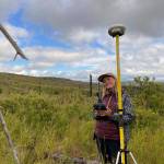 Frannie Nelson collecting ground validation data for her undergraduate thesis in the Caribou Hills. (Photo by Angelica Smith/FWS)
