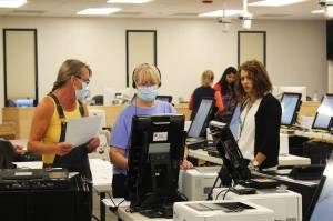 Kenai Peninsula Borough Clerk Johni Blankenship oversees the testing of voting equipment ahead of the Oct. 5 municipal election on Thursday, Sept. 9, 2021 in Soldotna, Alaska. (Ashlyn OHara/Peninsula Clarion)