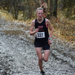 Jayna Boonstra of Kenai races her way to another Division II state cross country championship at Bartlett High School in Anchorage, Alaska on Saturday, Oct. 9, 2021. (Camille Botello/Peninsula Clarion)