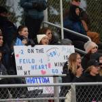 Fans cheer on the Soldotna Stars football team during the Division II state championship game against Lathrop at Service High School in Anchorage on Saturday, Oct. 16, 2021. (Camille Botello/Peninsula Clarion)