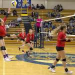 Kenai Centrals Jorgi Phillips attacks against Homer on Tuesday, Oct. 19, 2021, at Homer High School in Homer, Alaska. (Photo by Sarah Knapp/Homer News)