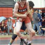 Kenai Centrals Cameron Cook tries to escape from Homers Russell Nyvall at the Luke Spruill Memorial Tournament on Saturday, Oct. 23, 2021, at Kenai Central High School. Cook was first at 145 pounds, while Nyvall was third. Nyvall won this match by 7-3 decision. (Photo by Jeff Helminiak/Peninsula Clarion)