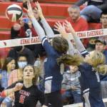 Kenai Centrals Brooke Ashley attacks Soldotnas Adarra Hagelund and Jolie Widaman on Tuesday, Oct. 26, 2021, at Kenai Central High School in Kenai, Alaska. (Photo by Jeff Helminiak/Peninsula Clarion)