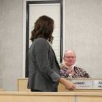 Kenai Peninsula Borough Clerk Johni Blankenship collects a ballot from assembly member Brent Hibbert on Tuesday, Oct. 26, 2021 in Soldotna, Alaska. The assembly elected a new president and vice president during a meeting on Tuesday. (Photo by Ashlyn OHara/Peninsula Clarion)