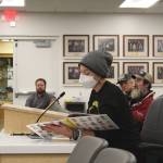 KPBSD Itinerant Counselor Natali Jones reads All Are Welcome by Alexandra Penfold in support of the LGBTQ+ community during a meeting of the Kenai Peninsula Borough School District Board of Education on Monday, Nov. 1, 2021 in Soldotna, Alaska. Treatment of LGBTQ+ students within the school district dominated public testimony during the boards Monday night meeting. (Ashlyn OHara/Peninsula Clarion)