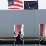 A voter fills out their ballot in the Thunder Mountain High School gymnasium during the 2020 general election. With more than a year to go before the 2022 election, spending is ramping up. (Ben Hohenstatt / Juneau Empire File)