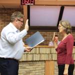 Kenai Mayor Brian Gabriel (left) swears in Kenai City Council Member Deborah Sounart during a meeting of the Kenai City Council on Wednedsay, Nov. 3, 2021 in Kenai, Alaska. (Ashlyn OHara/Peninsula Clarion)