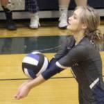Soldotnas Jolie Wildaman receives a serve during the first day of the Northern Lights Conference Championships on Thursday at Palmer High School. (Photo by Jeremiah Bartz/Frontiersman)