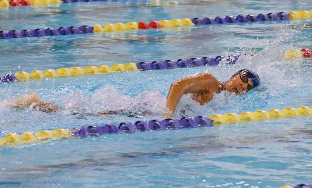 Homers Jillian Crooks competes in the state swimming finals at Bartlett High School in Anchorage on Saturday, Nov. 6, 2021. (Camille Botello/Peninsula Clarion)