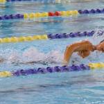 Homer's Jillian Crooks competes in the state swimming finals at Bartlett High School in Anchorage on Saturday, Nov. 6, 2021. (Camille Botello/Peninsula Clarion)