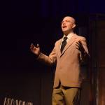 Josiah Burton performs as his character Oliver Daddy Warbucks in Soldotna High Schools production of Annie on Tuesday, Nov. 9, 2021. (Camille Botello/Peninsula Clarion)