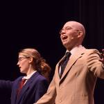Josiah Burton performs as his character Oliver Daddy Warbucks in Soldotna High Schools production of Annie on Tuesday, Nov. 9, 2021. (Camille Botello/Peninsula Clarion)