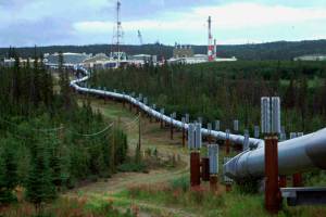 This photo shows the trans-Alaska pipeline and pump station north of Fairbanks. (AP Photo/Al Grillo)