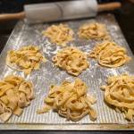 Before boiling, this handmade pasta is rolled, cut and tossed in flour to keep from sticking. (Photo by Tressa Dale/Peninsula Clarion)
