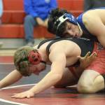 Soldotna's Isaac Chavarria wrestles to a major decision over Kenai Central's Andrew Gaethle at 152 pounds during a dual meet at Kenai Central High School on Tuesday, Nov. 16, 2021, in Kenai, Alaska. (Photo by Jeff Helminiak/Peninsula Clarion)