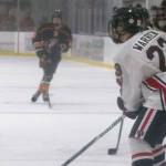 Kenai Central's Caden Warren surveys the ice against West at the End of the Road Tournament at Kevin Bell Arena in Homer, Alaska. (Photo by Sarah Knapp/Homer News)