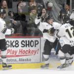 Cole Dubicki (center) celebrates his short-handed goal in the second period against the Springfield (Illinois) Jr. Blues on Friday, Nov. 19, 2021, at the Soldotna Regional Sports Complex. (Photo by Jeff Helminiak/Peninsula Clarion)
