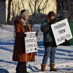 Demonstrators gather outside of Central Peninsula Hospital in Soldotna to protest COVID-19 vaccine mandates and advocate for alternative treatments on Saturday, Nov. 20, 2021. (Camille Botello/Peninsula Clarion)