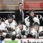 Assistant coach Taylor Shaw leads the Kenai River Brown Bears during a game Thursday, Nov. 18, 2021, against the Springfield (Illinois) Jr. Blues at the Soldotna Regional Sports Complex in Soldotna, Alaska. (Photo by Jeff Helminiak/Peninsula Clarion)
