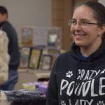 Amanda Alaniz sells fur products at the Soldotna Holiday Bazaar at the Soldotna Regional Sports Complex on Saturday, Nov. 20, 2021. (Camille Botello/Peninsula Clarion)