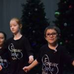 Forever Dance students practice for the Forever Christmas annual holiday variety show at Kenai Central High School on Tuesday, Nov. 23, 2021. (Camille Botello/Peninsula Clarion)