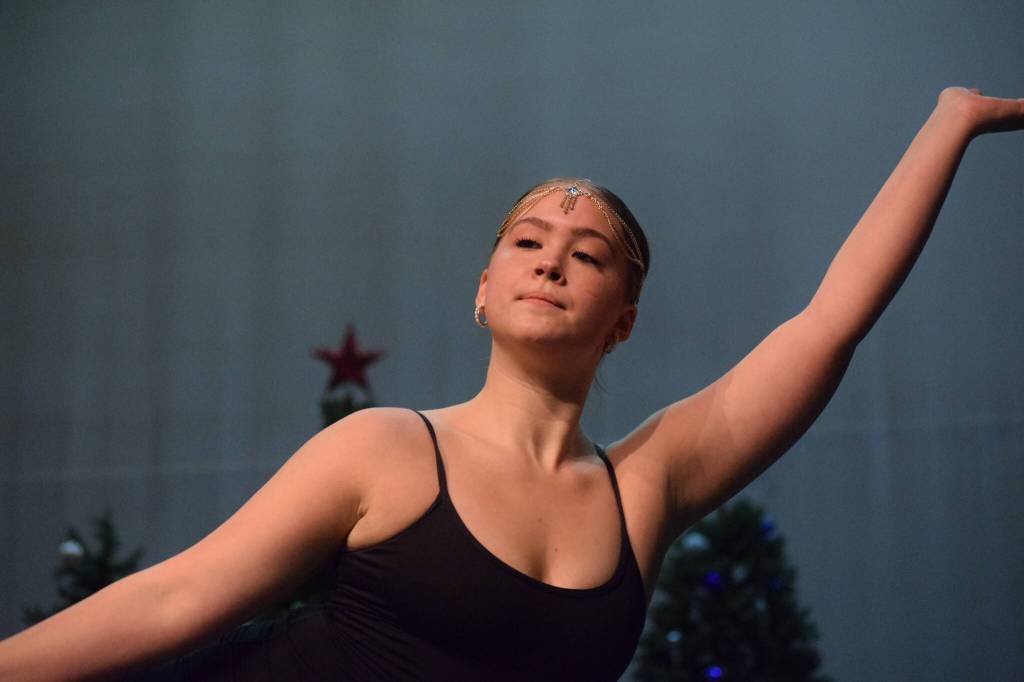 Forever Dance Alaska senior Chloee Swanson practices for her final Forever Christmas showcase at Kenai Central High School on Tuesday, Nov. 23, 2021. (Camille Botello/Peninsula Clarion)