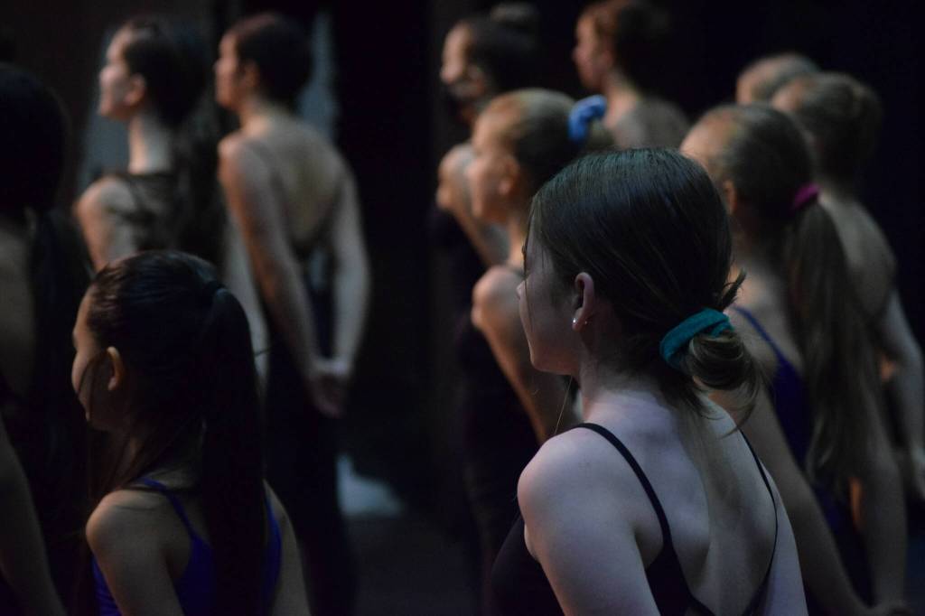 Forever Dance students practice for the Forever Christmas annual holiday variety show at Kenai Central High School on Tuesday, Nov. 23, 2021. (Camille Botello/Peninsula Clarion)