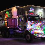 A decorated truck owned by Kenai Peninsula Driving Instruction participates in the Christmas Comes to Kenai parade on Friday, Nov. 26, 2021 in Kenai, Alaska. (Ashlyn OHara/Peninsula Clarion)