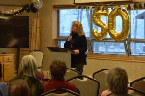 Kathy Romain, the executive director of the Kenai Senior Center, hosts a reception on Tuesday, Nov. 30, 2021 to celebrate the facilitys 50 years in Kenai, Alaska. (Camille Botello/Peninsula Clarion)