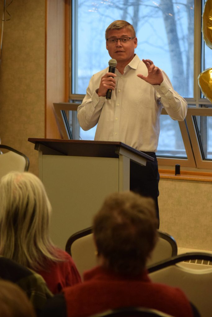 City Manager Paul Ostrander speaks at the Kenai Senior Centers 50th anniversary reception on Tuesday, Nov. 30, 2021 in Kenai, Alaska. (Camille Botello/Peninsula Clarion)