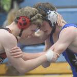 Kenai Centrals Andrew Gaethle and Soldotnas Collin Peck battle at 160 pounds in a dual meet at Soldotna High School on Tuesday, Nov. 30, 2021, in Soldotna, Alaska. Gaethle notched an 8-3 decision.