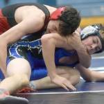 Kenai Centrals Owen Whicker works to a pin of Soldotnas Nicholas Rackley at 130 pounds in a dual meet at Soldotna High School on Tuesday, Nov. 30, 2021, in Soldotna, Alaska. (Photo by Jeff Helminiak/Peninsula Clarion)