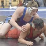 Soldotna's Wayne Mellon works to a pin of Kenai Central's Zoticus Active at 189 pounds in a dual meet at Soldotna High School on Tuesday, Nov. 30, 2021, in Soldotna, Alaska. (Photo by Jeff Helminiak/Peninsula Clarion)