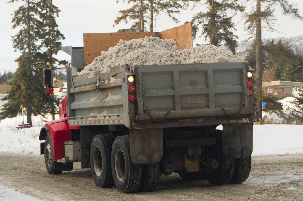 A truck carries snow recently plowed in Homer, Alaska, on Dec. 7, 2021. (Photo by Sarah Knapp/Homer News)