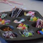 An array of sweets were used by kids making homemade gingerbread houses at the Nikiski Community Recreation Center on Saturday, Dec. 11, 2021, in Nikiski, Alaska. (Camille Botello/Peninsula Clarion)