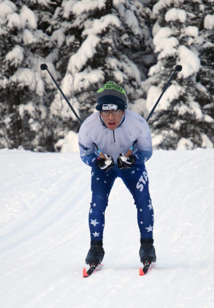 Soldotnas Josh Lynner tucks down the final hill on the 5-kilometer mass start classic course Saturday, Dec. 11, 2021, at Tsalteshi Trails just outside of Soldotna, Alaska. (Photo by Jeff Helminiak/Peninsula Clarion)