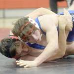 Kenai Centrals Owen Whicker and Soldotnas Ezekiel Miller wrestle at Kenai Central High School on Tuesday, Nov. 16, 2021, in Kenai, Alaska. (Photo by Jeff Helminiak/Peninsula Clarion)