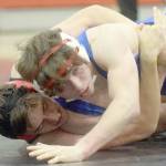 Kenai Central's Owen Whicker and Soldotna's Ezekiel Miller wrestle at Kenai Central High School on Tuesday, Nov. 16, 2021, in Kenai, Alaska. (Photo by Jeff Helminiak/Peninsula Clarion)
