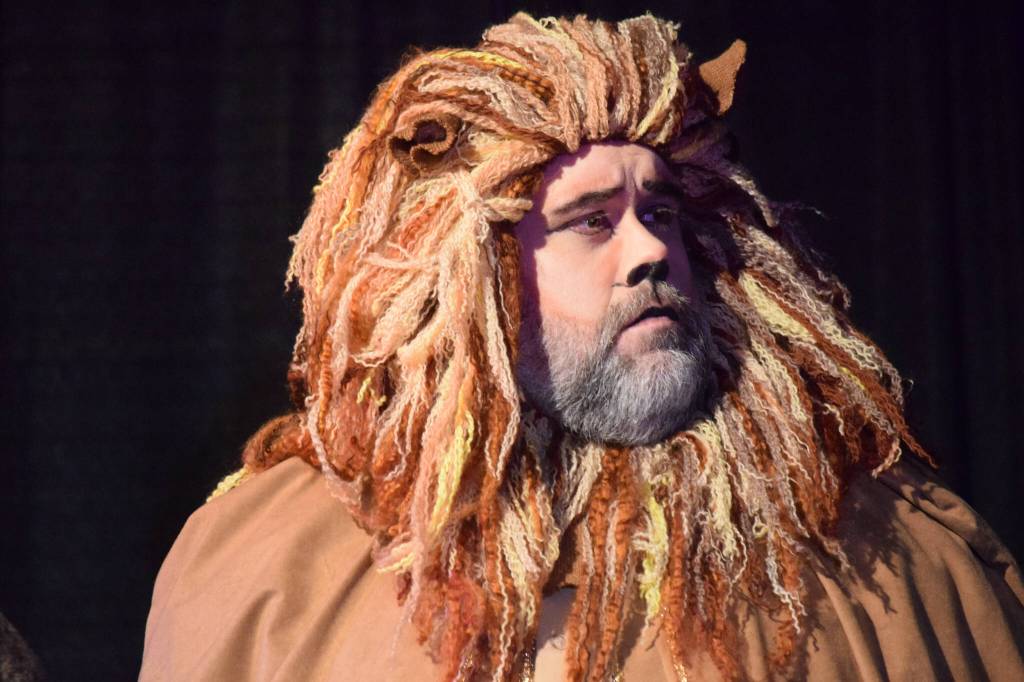 Ian McEwen performs as Aslan during the Triumvirate Theatres rehearsal of The Chronicles of Narnia: The Lion, the Witch and the Wardrobe at Kenai Central High School on Tuesday, Dec. 14, 2021. (Camille Botello/Peninsula Clarion)