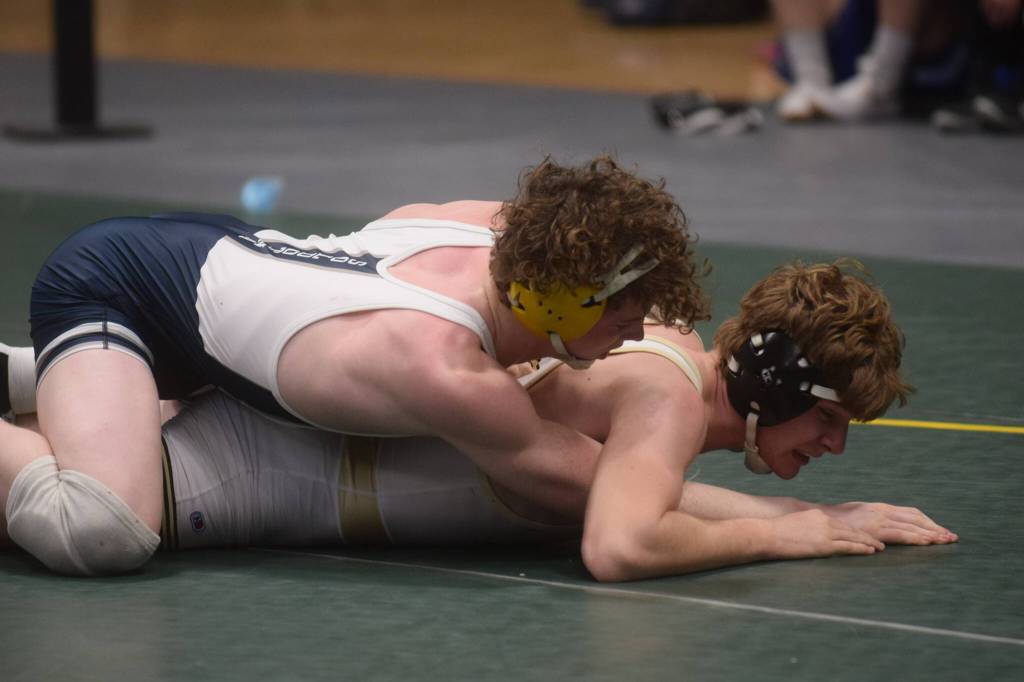 Soldotnas Hunter Richardson competes in the Division I state wrestling championship at the Alaska Airlines Center in Anchorage on Saturday, Dec. 18, 2021. (Camille Botello/Peninsula Clarion)