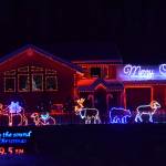 The Allemann house in Nikiski is illuminated during a Christmas light show on Sunday, Dec. 19, 2021. (Camille Botello/Peninsula Clarion)