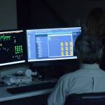 Robin and Jim Allemann program their Christmas light show from inside their home in Nikiski on Sunday, Dec. 19, 2021. (Camille Botello/Peninsula Clarion)