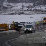 Homer Volunteer Fire Department firefighters respond to a natural gasline break on Lake Street at the Beluga Lake causeway at about 12:30 p.m. Monday, Dec. 20, 2021, in Homer, Alaska. (Photo by Michael Armstrong/Homer News)