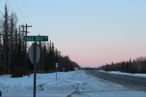 Cars drive along the Kenai Spur Highway near Eagle Rock Drive on Tuesday, Jan. 4, 2021 near Kenai, Alaska. The highway will be widened under a state transportation project. (Ashlyn OHara/Peninsula Clarion)