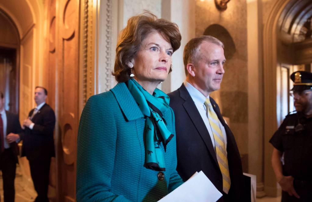 Sen. Lisa Murkowski, R-Alaska, and Sen. Dan Sullivan, R-Alaska, leave the chamber after a vote on Capitol Hill in Washington, early Wednesday, May 10, 2017. Jay Allen Johnson, 65, who faced charges of sending a series of profanity-laced voice messages to the two senators, entered guilty pleas, Monday, Jan. 3, 2022, in federal court in Fairbanks, Alaska, to two counts of threatening to kill a U.S. official. U.S. District Judge Ralph Beistline accepted Johnsons pleas and set sentencing for April 8. (AP Photo/J. Scott Applewhite, File)