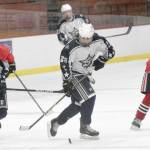 Soldotnas Gehret Medcoff prepares to enter the zone with teammate Daniel Heath against Juneau-Douglas on Thursday, Jan. 6, 2022, at the Soldotna Regional Sports Complex in Soldotna, Alaska. (Photo by Jeff Helminiak/Peninsula Clarion)
