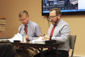 Kenai City Manager Paul Ostrander (left) and Kenai Finance Director Terry Eubank (right) moderate a city council work session discussing budget goals at Kenai City Hall on Monday, Jan. 10, 2021 in Kenai, Alaska. (Ashlyn O'Hara/Peninsula Clarion)