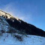 Snow blows off Mt. Roberts high above the Thane avalanche chute, where an avalanche blew across the road during a major snowstorm. (Michael S. Lockett / Juneau Empire)